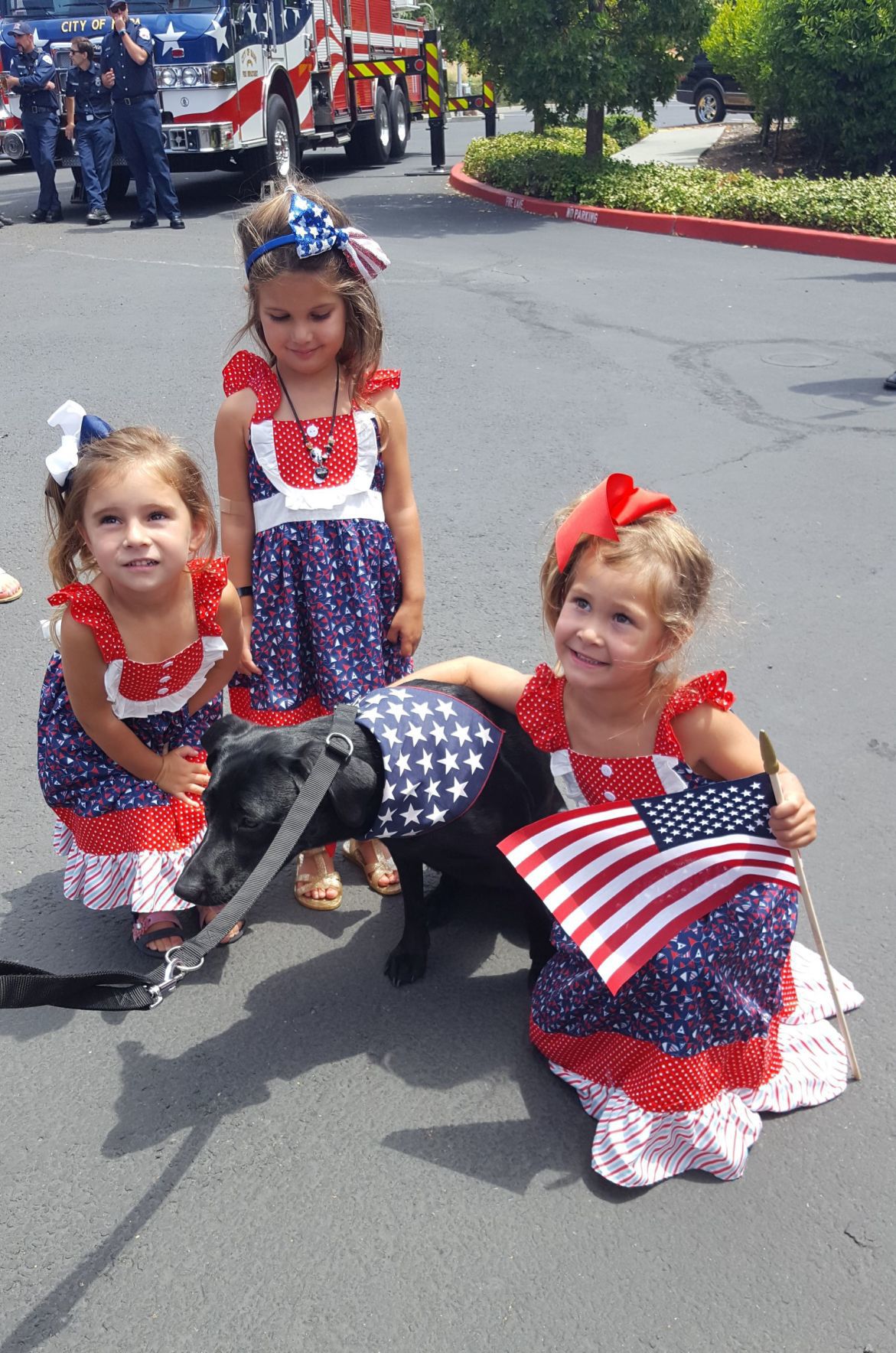 Children with Cory Miele's dog Caliber
